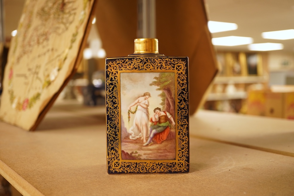 A Vienna style porcelain tea cannister, hand painted with figures, 15cm high